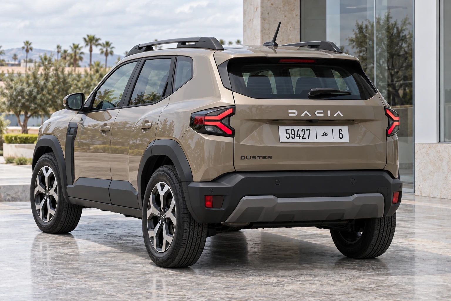 Dacia Duster rental SUV, rear three-quarter view
